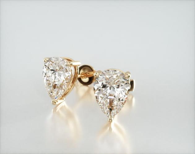 Pear cut moissanite STUDS in 18k gold