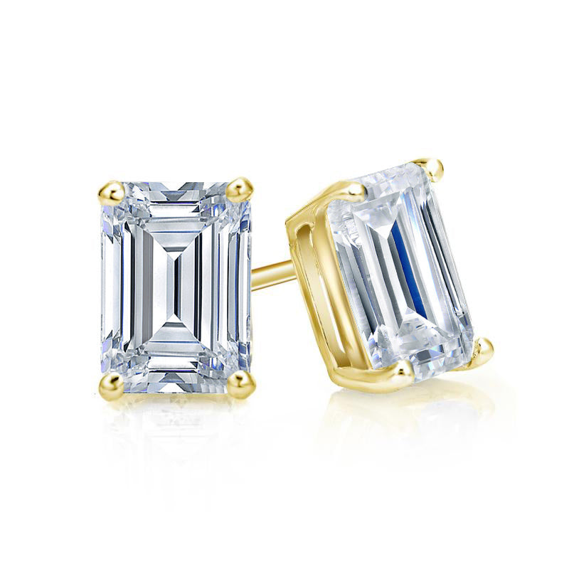 Emerald cut moissanite studs in 18k gold