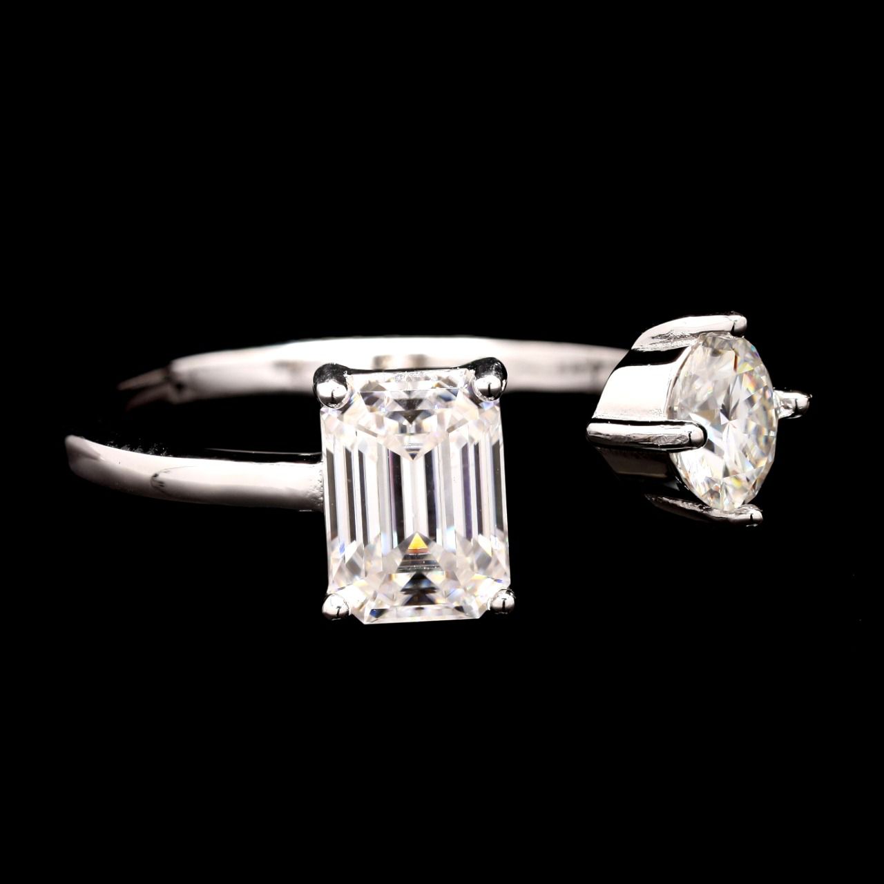 Emerald cut and round cut moissanite ring in silver