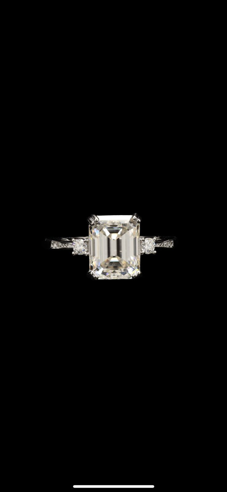 Emerald cut and small size Round cut moissanite in silver