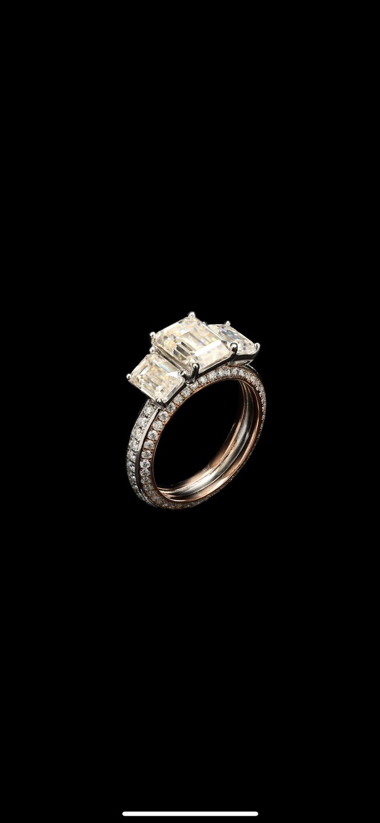 Emerald cut and round cut moissanite ring in silver