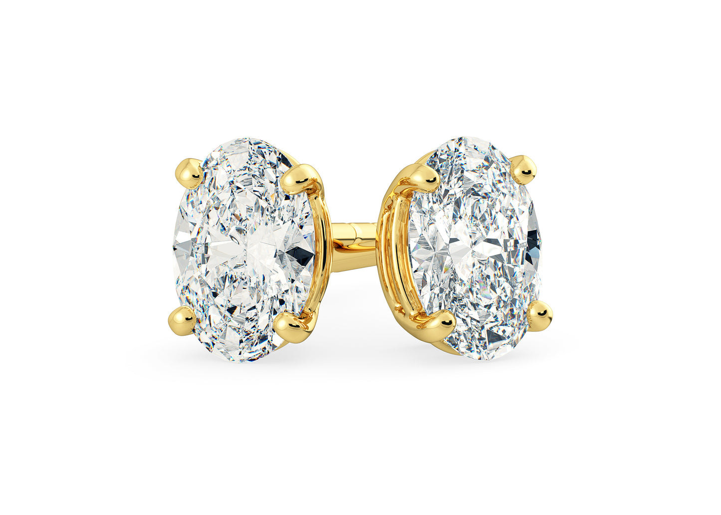 Oval cut moissanite STUDS in 18k gold